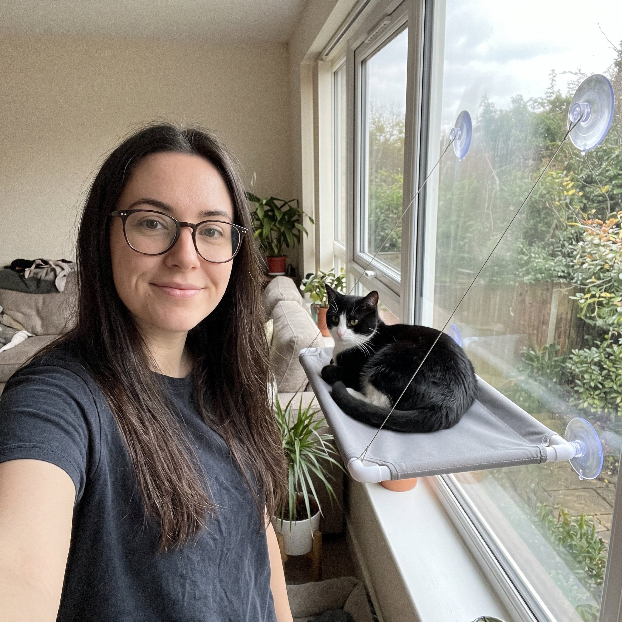 Owner Selfie Beside A Cat On Grey Perch